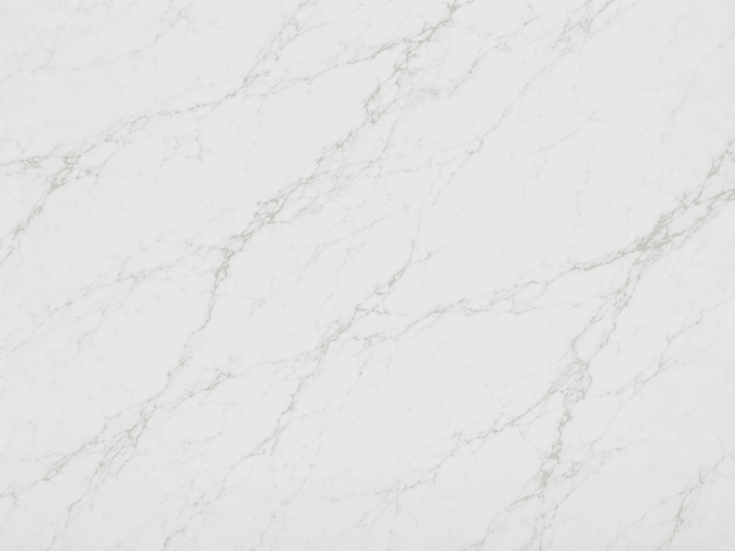 Carrara quartz slab with soft grey veining