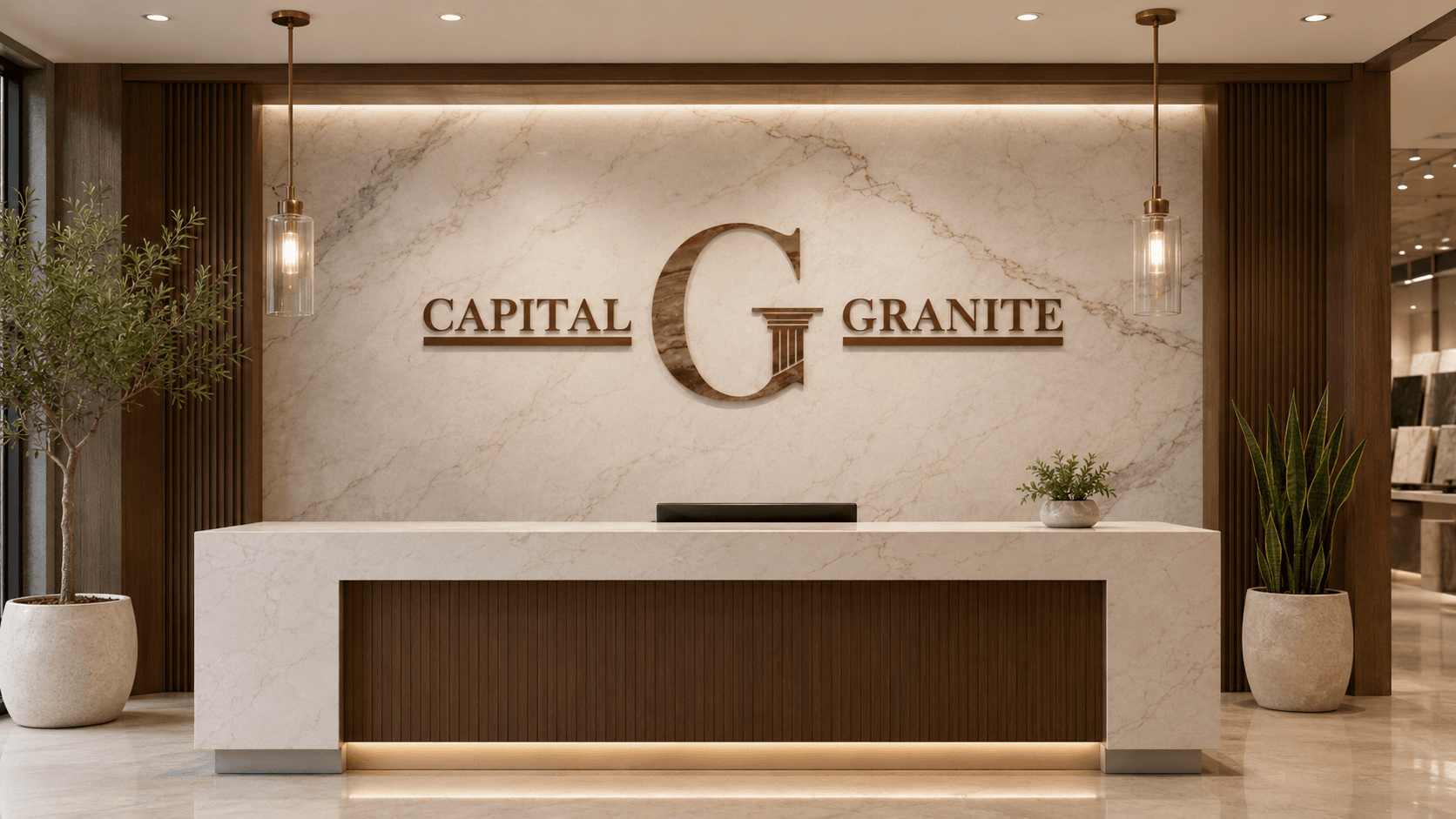 Capital Granite showroom reception with a branded quartz feature wall